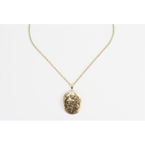 171 - A 1980s 9ct Gold Chain and Locket, marked: ZJ. Locket size: 5cms x 4cms. Chain Length: 60cms. Weighi... 