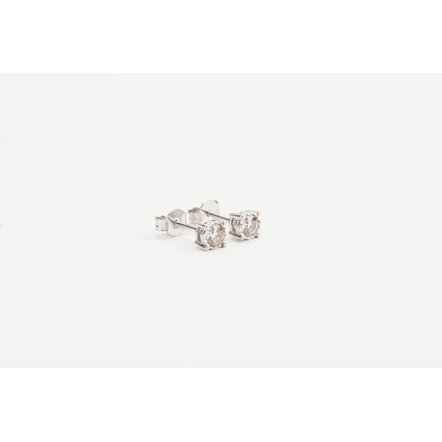 173 - A Pair of 9ct White Gold Solitaire Diamond Earrings. Diamond size: 0.3ct. Weight: 1.2 grams.