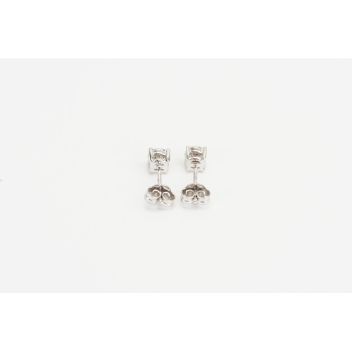 173 - A Pair of 9ct White Gold Solitaire Diamond Earrings. Diamond size: 0.3ct. Weight: 1.2 grams.