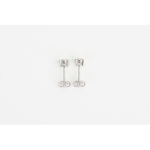 173 - A Pair of 9ct White Gold Solitaire Diamond Earrings. Diamond size: 0.3ct. Weight: 1.2 grams.