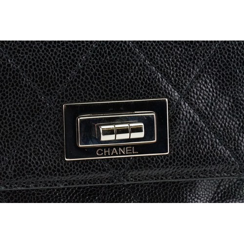 273 - A Chanel Pocket in the City Travel Bag Caviar Large, in black caviar leather. Dual flat leather hand... 