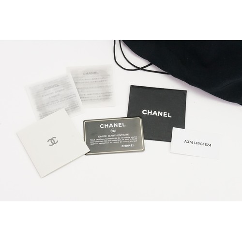 273 - A Chanel Pocket in the City Travel Bag Caviar Large, in black caviar leather. Dual flat leather hand... 