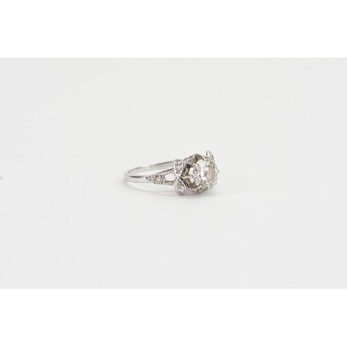 169 - An Art Deco designed Solitaire Diamond Ring in a Platinum setting. Main Diamond Approx 1.3ct. 6 Shou... 