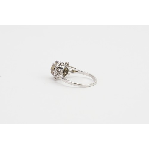 169 - An Art Deco designed Solitaire Diamond Ring in a Platinum setting. Main Diamond Approx 1.3ct. 6 Shou... 