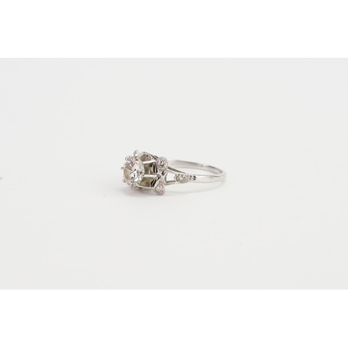 169 - An Art Deco designed Solitaire Diamond Ring in a Platinum setting. Main Diamond Approx 1.3ct. 6 Shou... 