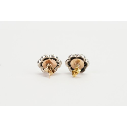 144 - An interesting Pair of Georgian Earrings in a Flower pattern, Foil Backed & Old Cut Diamonds. Larges... 