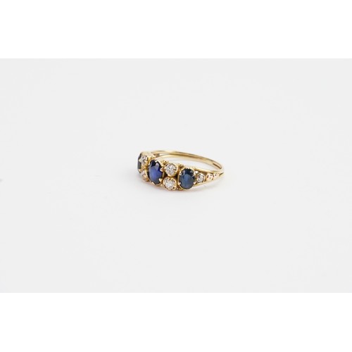 163 - A Ladies Antique Gold diamond and sapphire dress ring with six diamonds and three sapphires. size k.