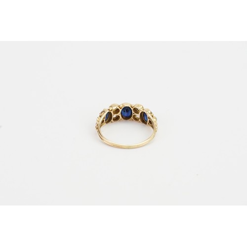 163 - A Ladies Antique Gold diamond and sapphire dress ring with six diamonds and three sapphires. size k.