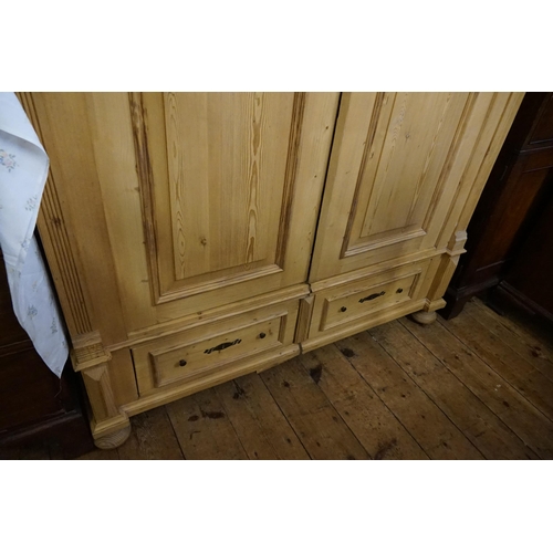 604 - A Pine Double Door Split Section Dutch Design Wardrobe Fitted with Bottom Drawers, Reeded and Floral... 