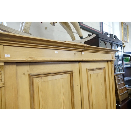 604 - A Pine Double Door Split Section Dutch Design Wardrobe Fitted with Bottom Drawers, Reeded and Floral... 