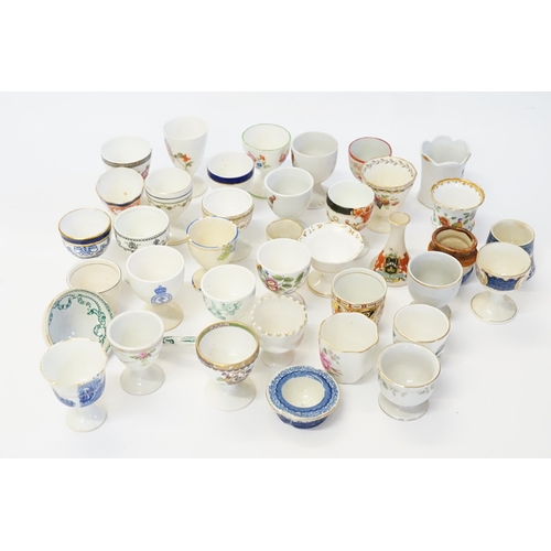 245 - A Collection of 30+ China Egg Cups to include 