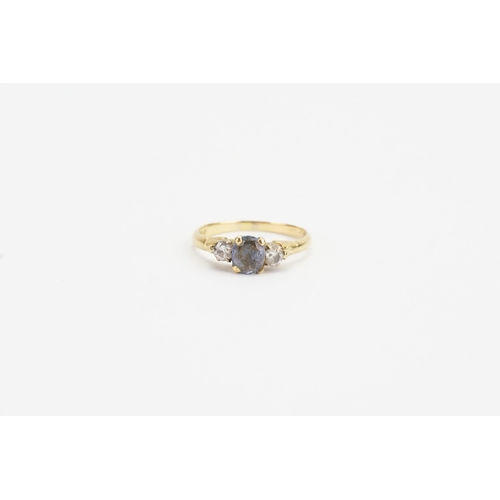 79 - An 18ct Gold Aquamarine & Diamond Set Ring. Weighing: 2.5 grams. Size: N.