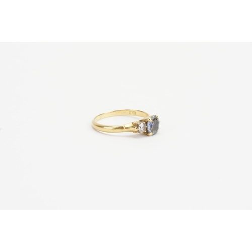 79 - An 18ct Gold Aquamarine & Diamond Set Ring. Weighing: 2.5 grams. Size: N.