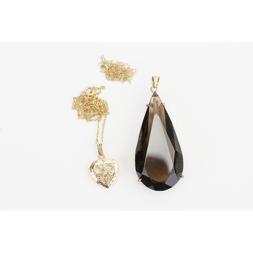 89 - A 9ct Gold Locket on a Chain along with one other Chain & a Smokey Quartz Pendant. Weighing: 3.1 gra... 