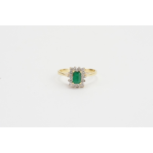 97 - An 18ct Gold Diamond & Emerald Set Ring, Emerald size: 4mms x 6.1mms. Weighing: 4.3 grams. Size: R.