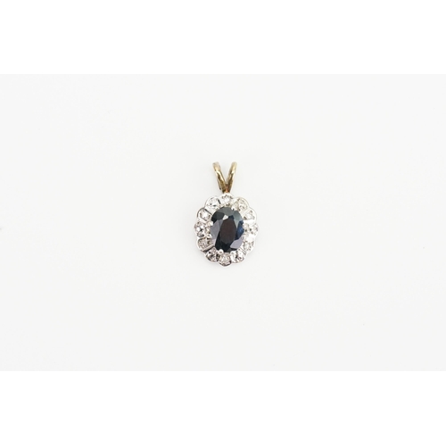 108 - A 9ct Gold Sapphire and Diamond pendant. Weighing: 1.6 grams.