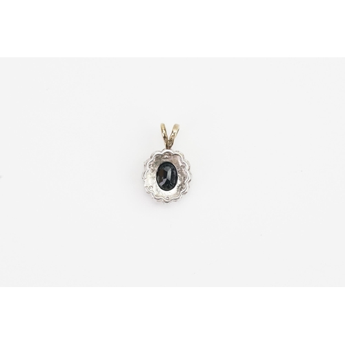 108 - A 9ct Gold Sapphire and Diamond pendant. Weighing: 1.6 grams.