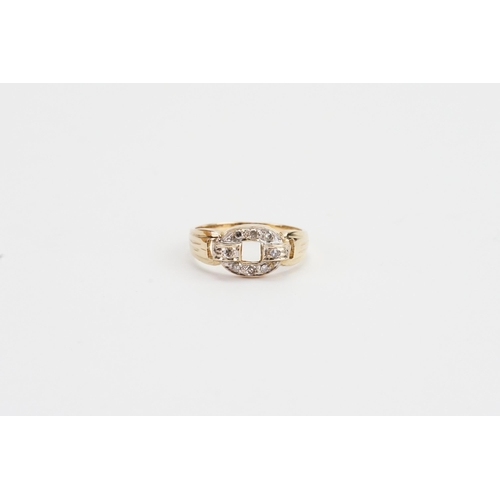 109 - A 14ct Gold Diamond set Buckle Ring set with 8 Small diamonds. Weighing: 2.9 grams. Size N.