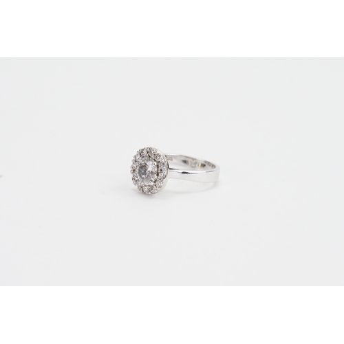 145 - A 14ct White Gold marked Diamond Ring set with surrounding Diamonds. 1.1ct Central Diamond, along wi... 