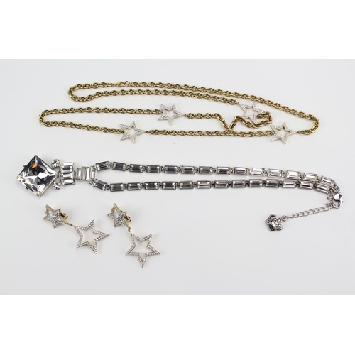 183 - A Butler & Wilson Gold Plated Star necklace & a similar crystal necklace in original box.