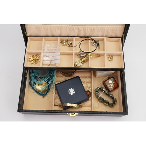 193 - A quantity of Costume Jewellery to include brooches, Necklaces, Earrings, etc. Contained in a Jewell... 