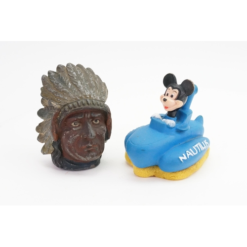 601 - A 20th Century Cast Iron Money Box depicting an Indian's Head & a Mickey Mouse Nautilus Sponge.