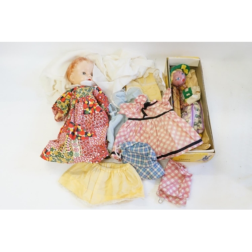 546 - A Pelham Puppet in Original Box along with a 1950s Doll with Clothing.