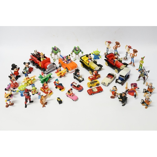 613 - A Collection of Disney Cars, Figures, Planes, etc to include Noddy, Pluto, Mickey Mouse, Buzz Lighty... 