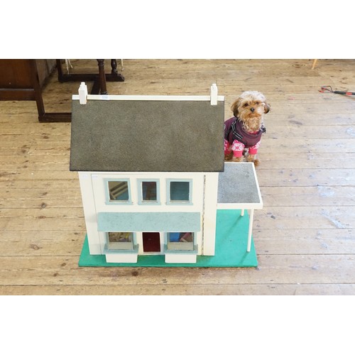 538 - A Scratch Built Dolls House Complete with Furniture. Measuring: 72cms across x 72cms high x 30cms de... 