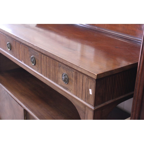 580 - A Victorian Mahogany Cross Banded Buffet fitted with two Drawers & Cupboard below with a raised back... 