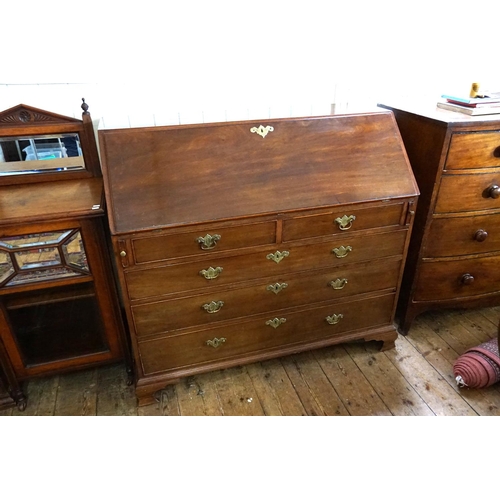 587 - A Georgian Mahogany Drop-Flap Bureau fitted with graduated Drawers, Pull Out Brush in Slide, Brass H... 