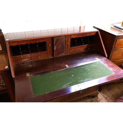 587 - A Georgian Mahogany Drop-Flap Bureau fitted with graduated Drawers, Pull Out Brush in Slide, Brass H... 