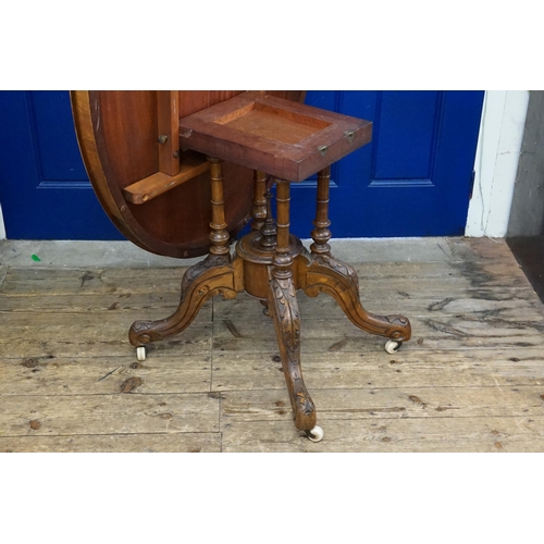 636 - A Victorian Design Fold Over Top Loo Table resting on a carved base with a later finish. Measuring: ... 