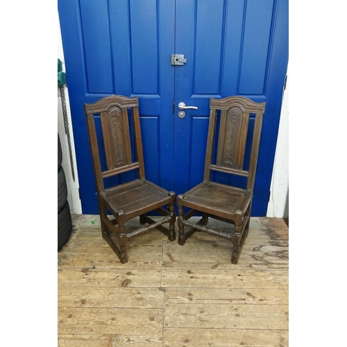 637 - A pair of antique oak side chairs, with carved back and turned legs, stretchers, with a good colour.