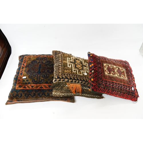 660 - Three Persian inspired Cushions made from old rugs.