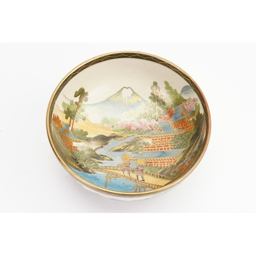 766 - A Japanese Kyoto ware Bowl decorated with figures on a Bamboo Bridge with Mount Fuji in background. ... 