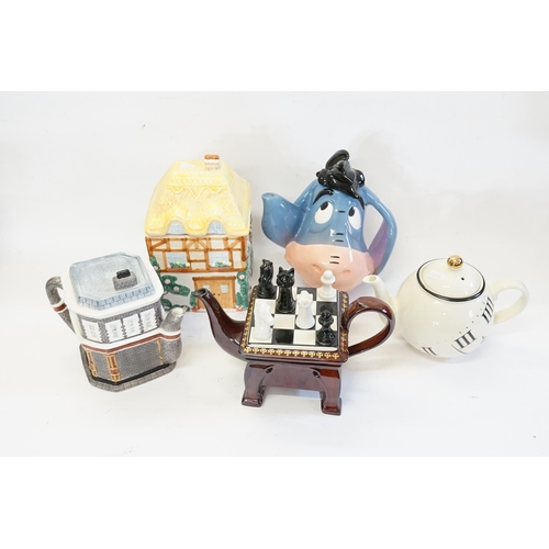 539 - A Collection of Five various Decorative Tea Pots to include Eeyore, Chess Table, Sun Dial & two othe... 