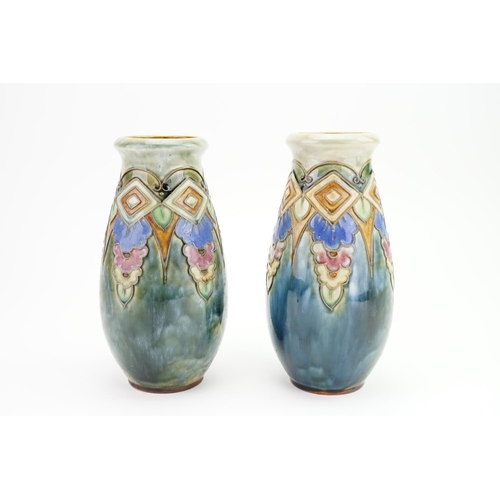 566 - A Pair of 1920s/1930s Trailing Slip Floral decorated Pottery Vases by 