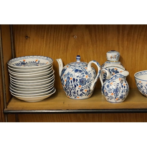 574 - A French Blue & White Rust decorated Tea Set consisting of a Villeneuve Tea Caddy, Sugar Bowl, Cream... 