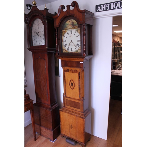 323 - A North Country Oak & Mahogany Cased Long Case Clock with a painted dial, Black Numeral Ring, Turned... 