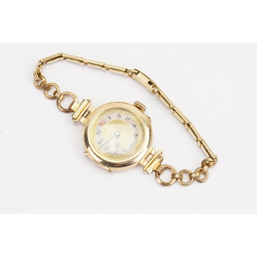 289 - A 9ct Gold Ladies Cocktail Watch with a Rolled Gold strap.