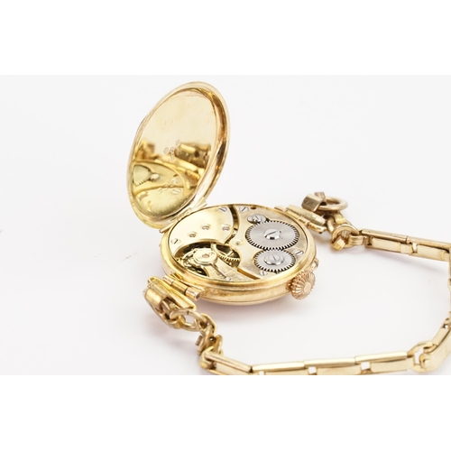 289 - A 9ct Gold Ladies Cocktail Watch with a Rolled Gold strap.