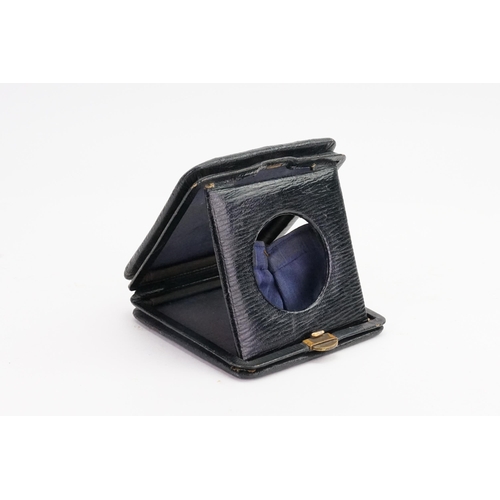 294 - A black leather Tri-Fold Pocket Watch holder. 9cm x 9cm x 2.8cm. 4.2cm in diameter (face section).