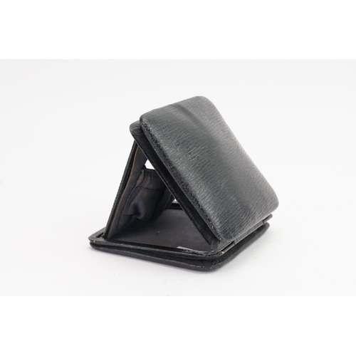 294 - A black leather Tri-Fold Pocket Watch holder. 9cm x 9cm x 2.8cm. 4.2cm in diameter (face section).