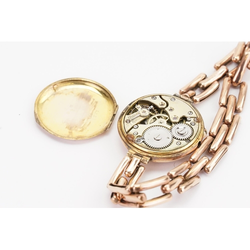 297 - A 9ct Gold cased cocktail watch, with a Gold coloured strap. Weight 24g.