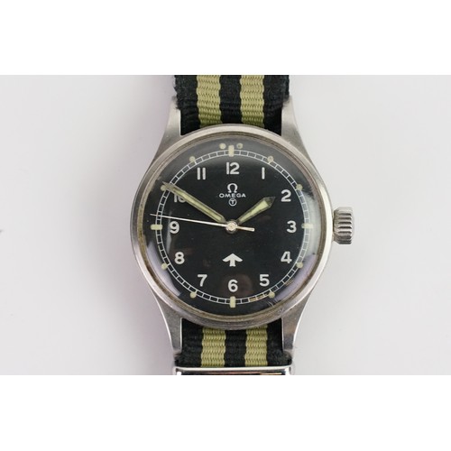 301 - A Gentleman’s Omega T Military Watch with a black striped strap. Marked 6645 101000 6B/542 1158 - 53... 