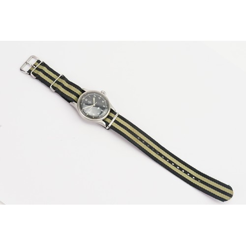 301 - A Gentleman’s Omega T Military Watch with a black striped strap. Marked 6645 101000 6B/542 1158 - 53... 