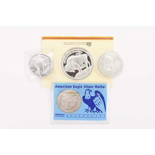 425 - A collection of 4 American coins, to include a 2 Ounce Silver buffalo nickel coin, a 1987 prospector... 