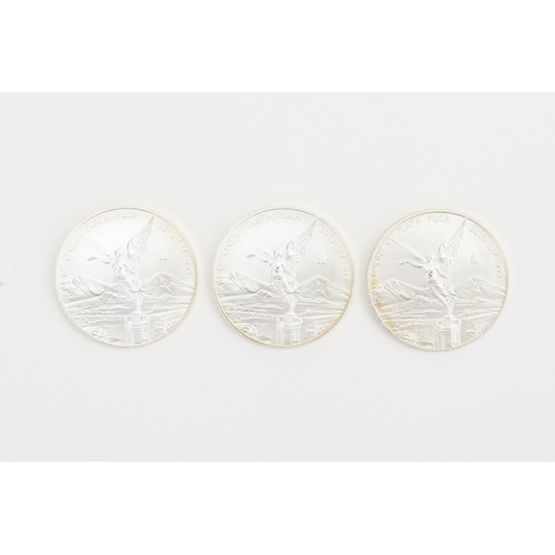 426 - A collection of three 2013 1/4 Ounce Silver Mexican estados unidos mexicanos coins. Platter Pura rev... 