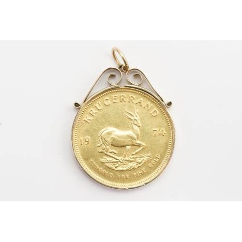 412 - A 1974 Krugerrand 1oz Gold Coin in a 9ct Gold mount. (Total Weight: 0.294 oz).